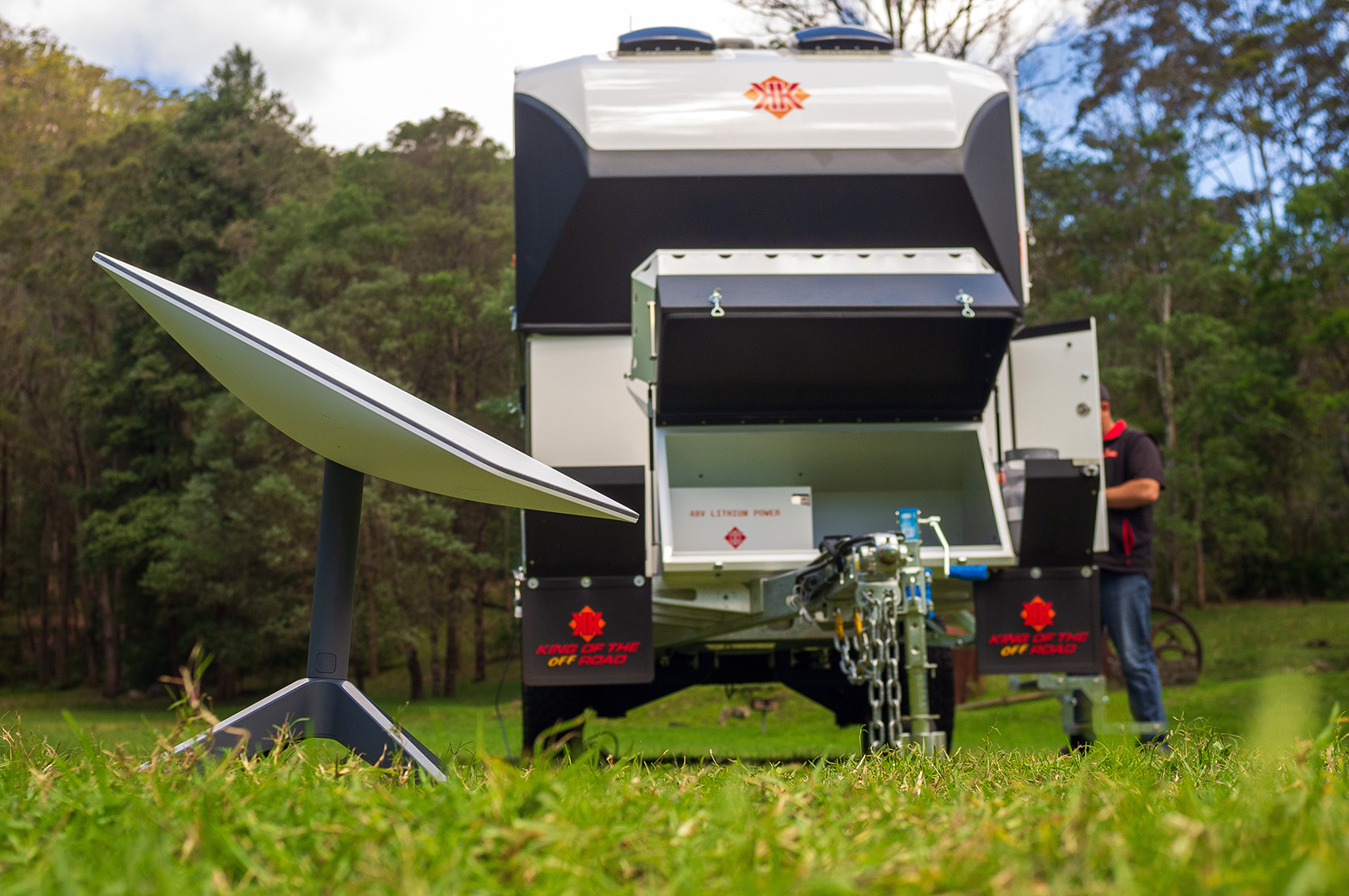 Offroad caravan with Starlink satellite internet dish in front